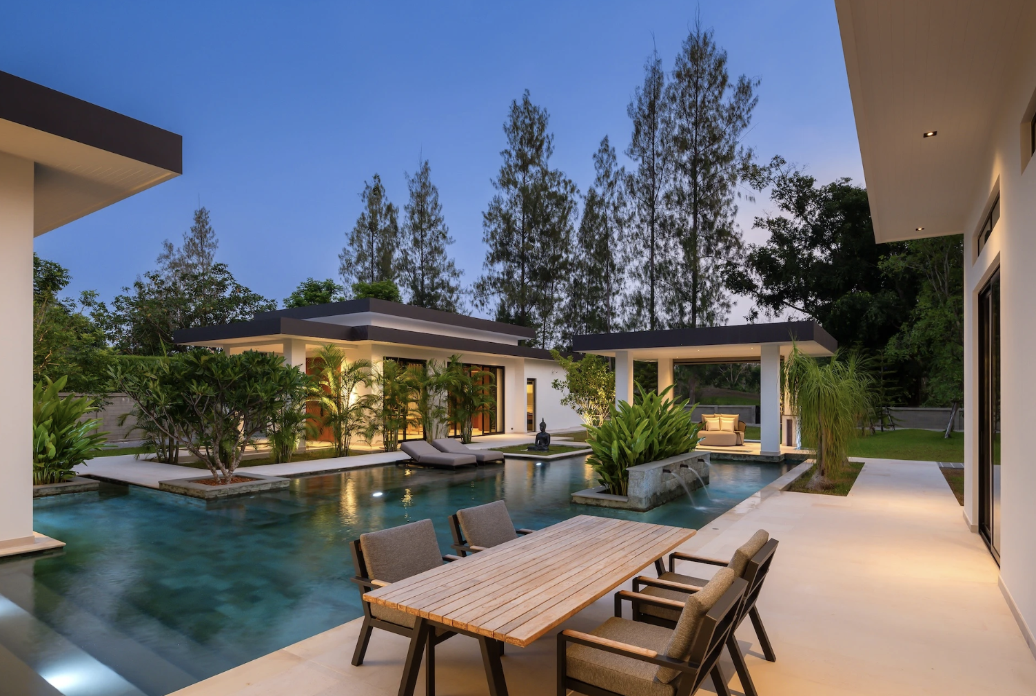 Modern villa with pool and greenery