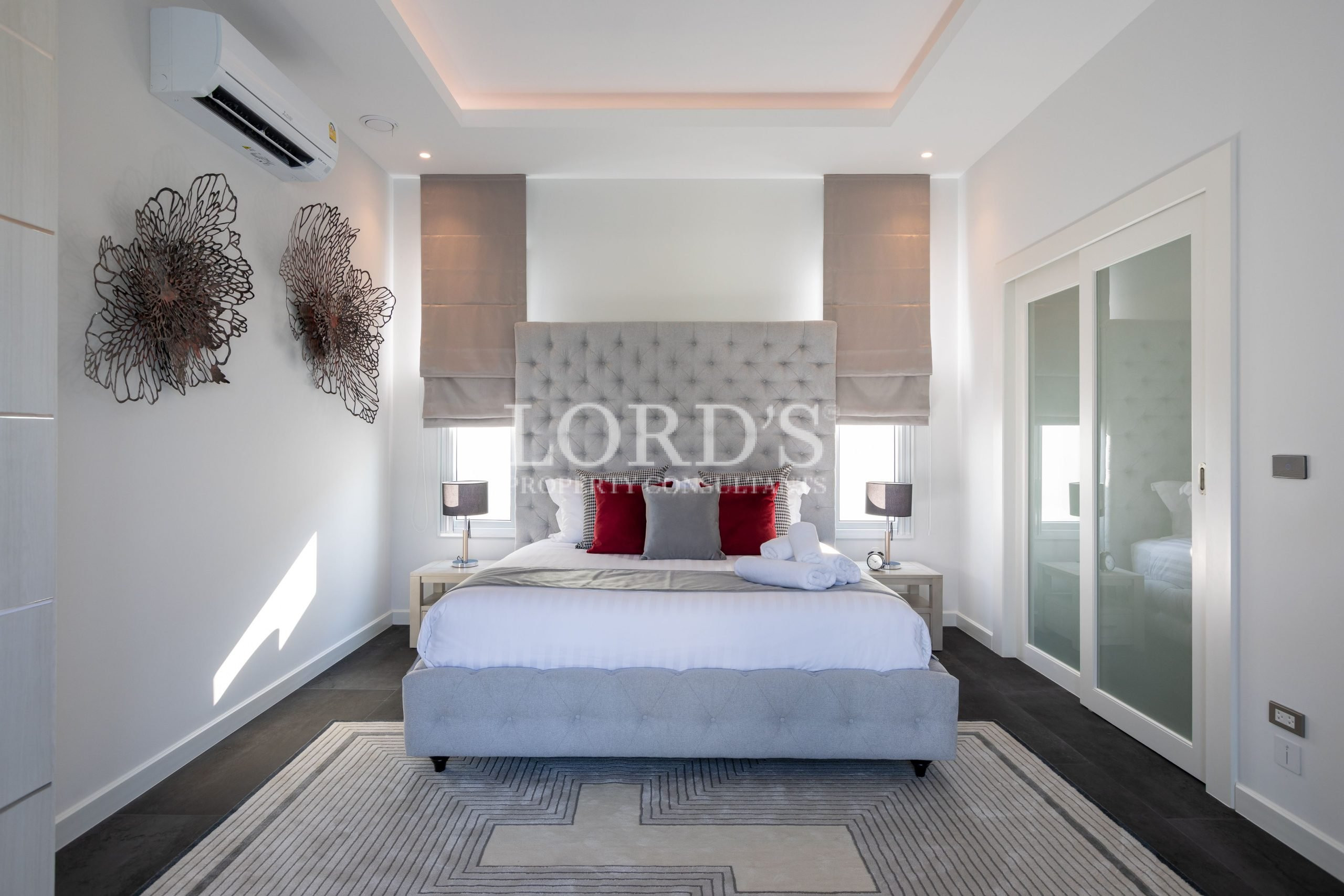 Contemporary bedroom with accent wall