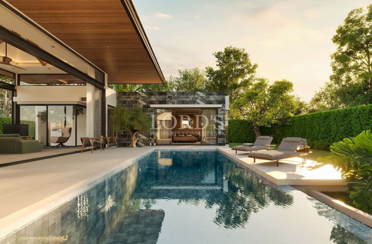 Modern poolside with lush greenery
