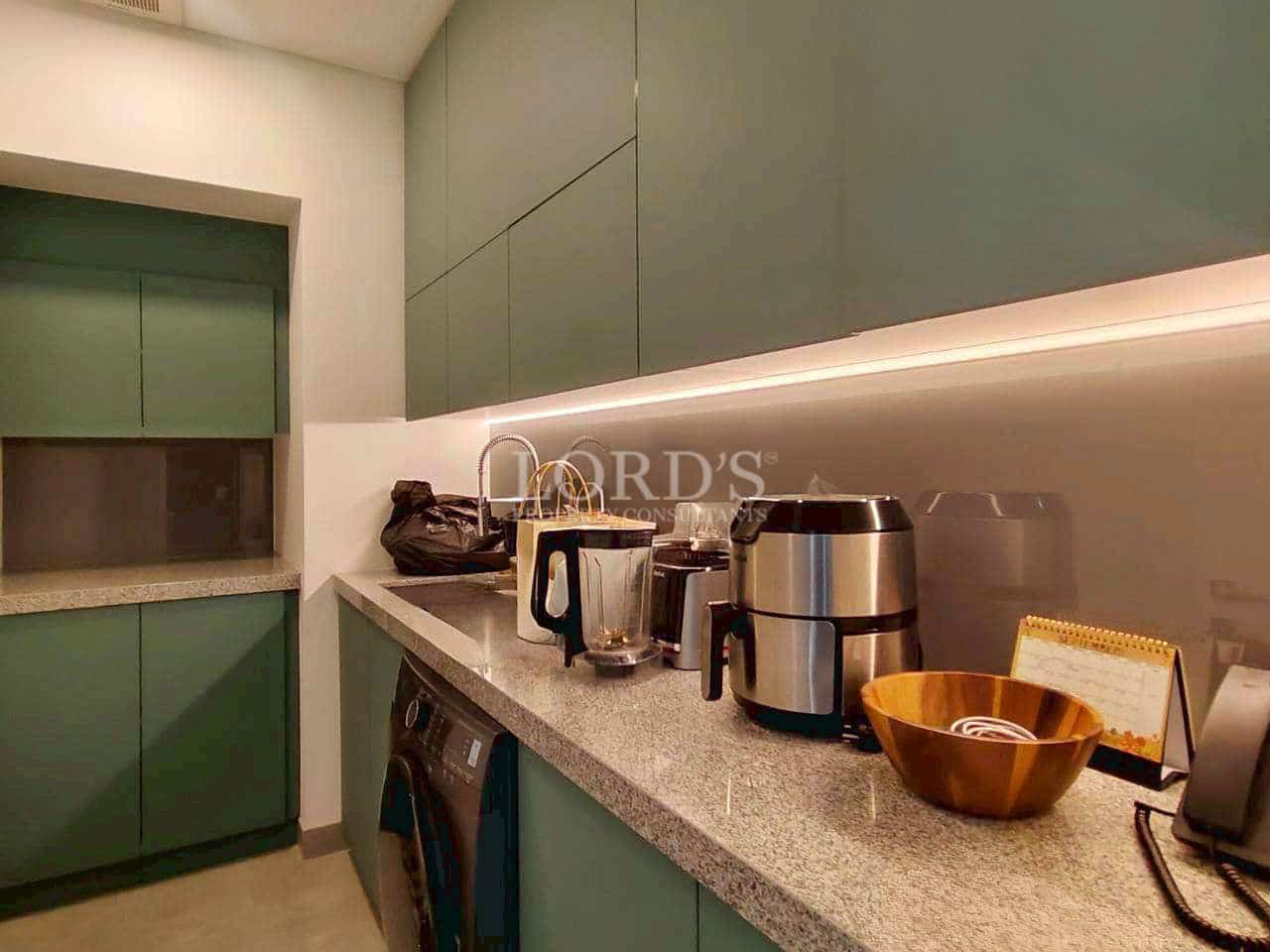 Modern kitchen with appliances and decor