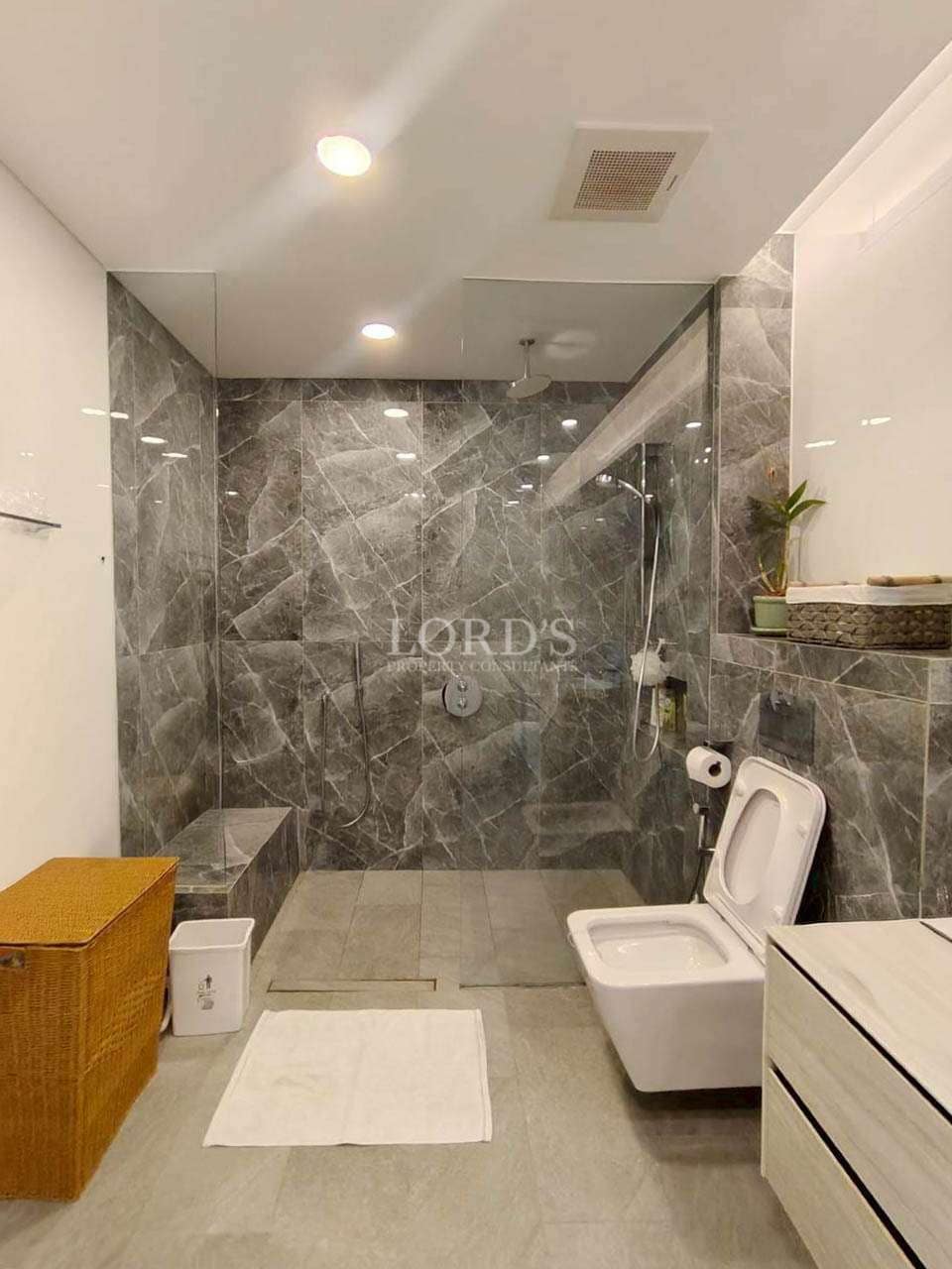 Modern bathroom with marble walls