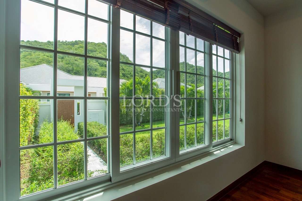 Large window with garden and mountain view