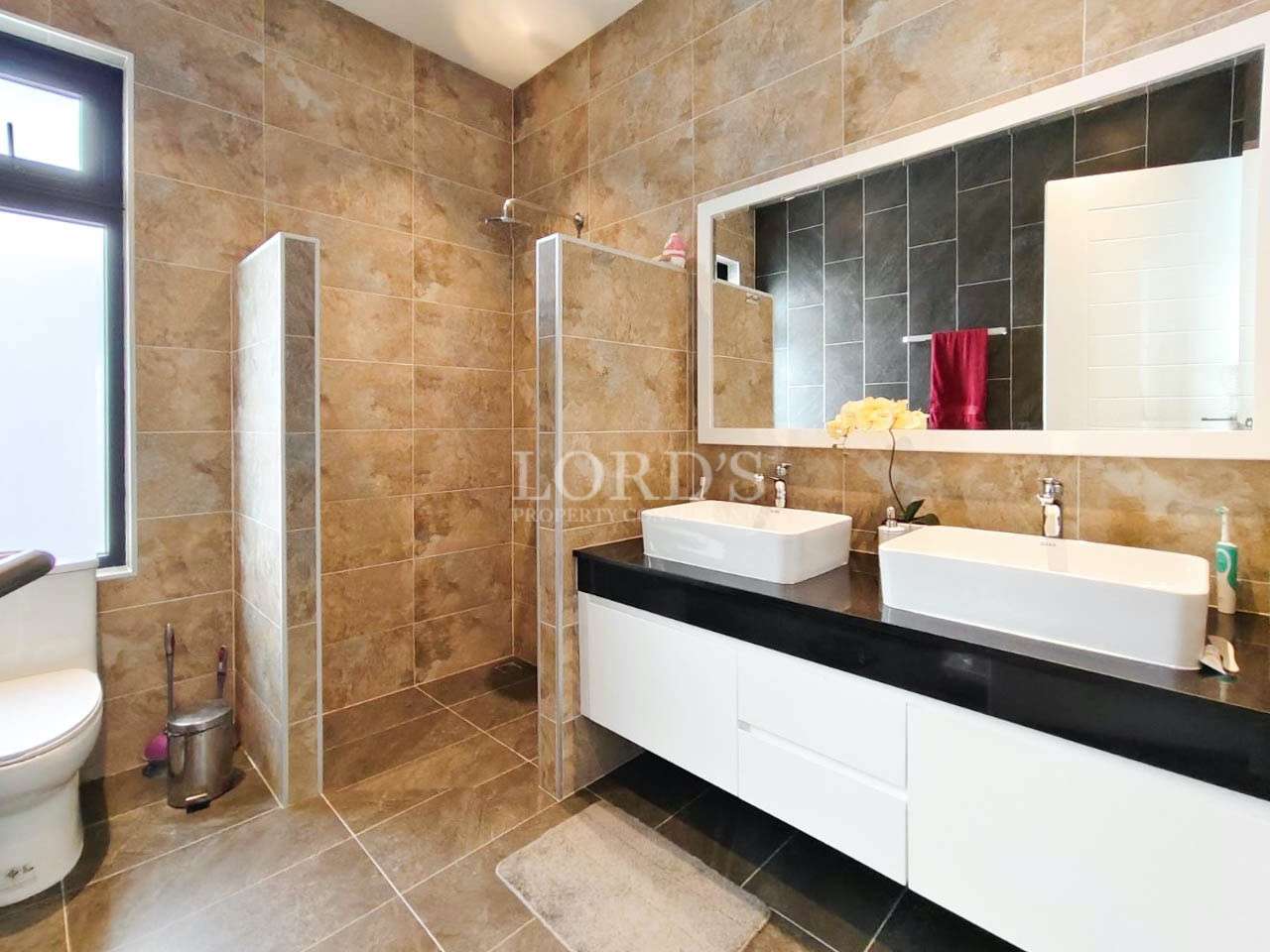 Bathroom with double vanity and mirrors