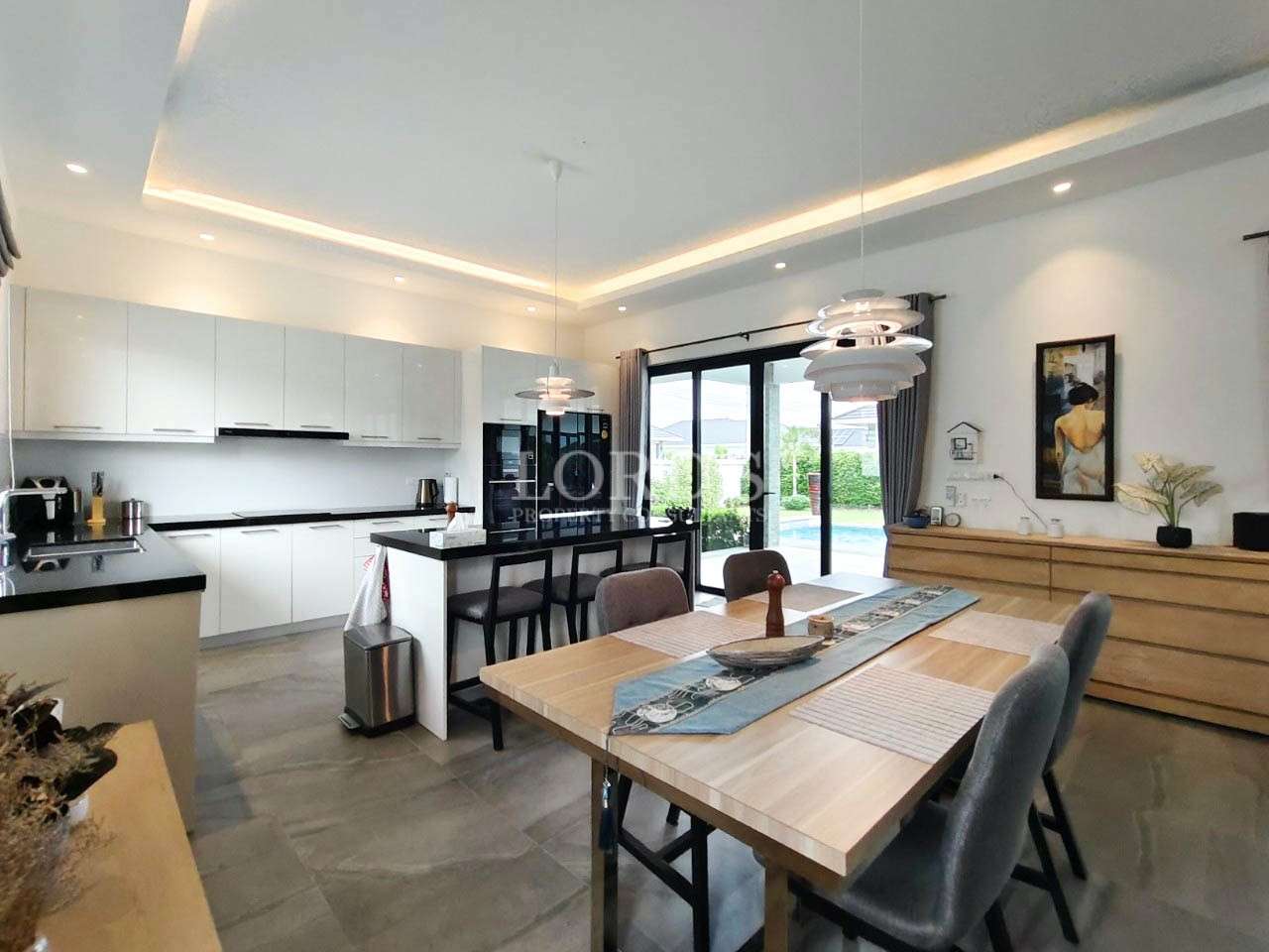 Dining space with chandelier and table