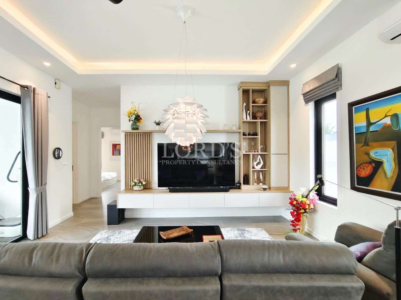 Living room with sofa and TV wall