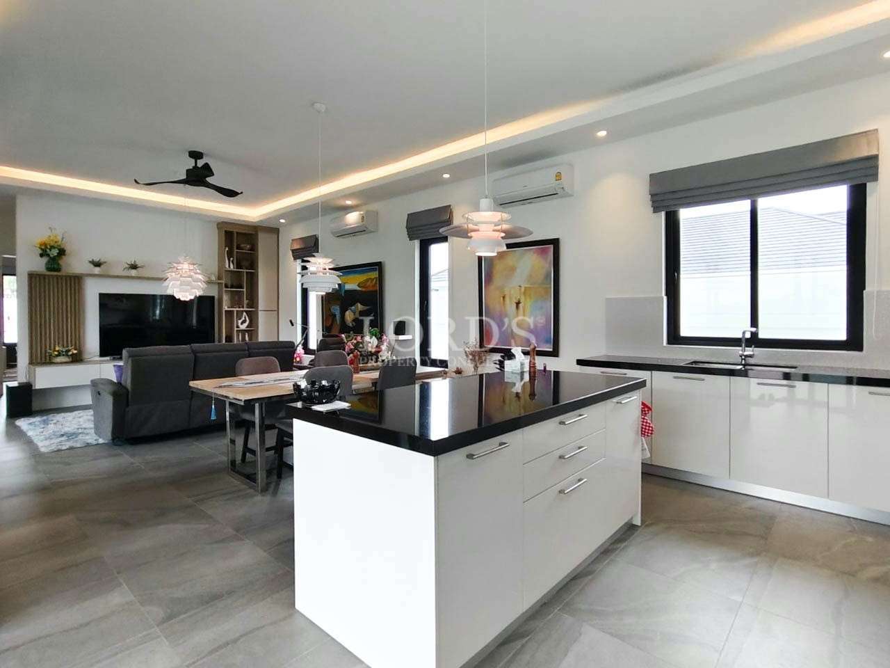 Kitchen with island and bar stools