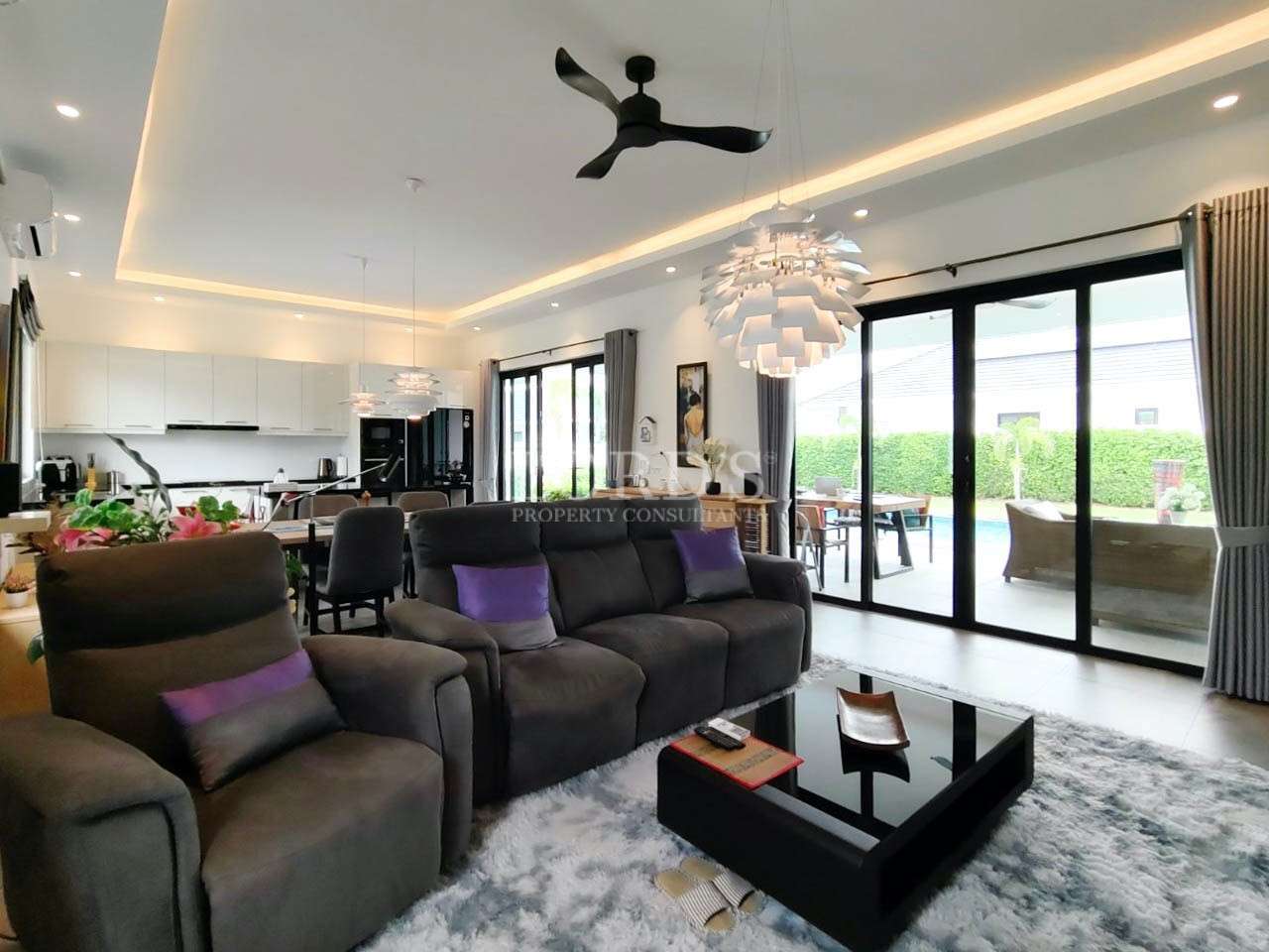 Living room with sofa and ceiling fan