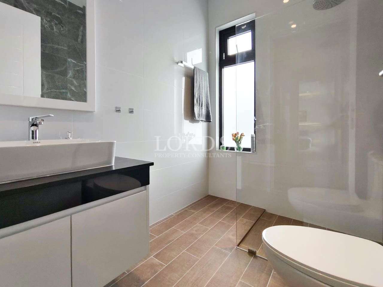 Bathroom with toilet and window light