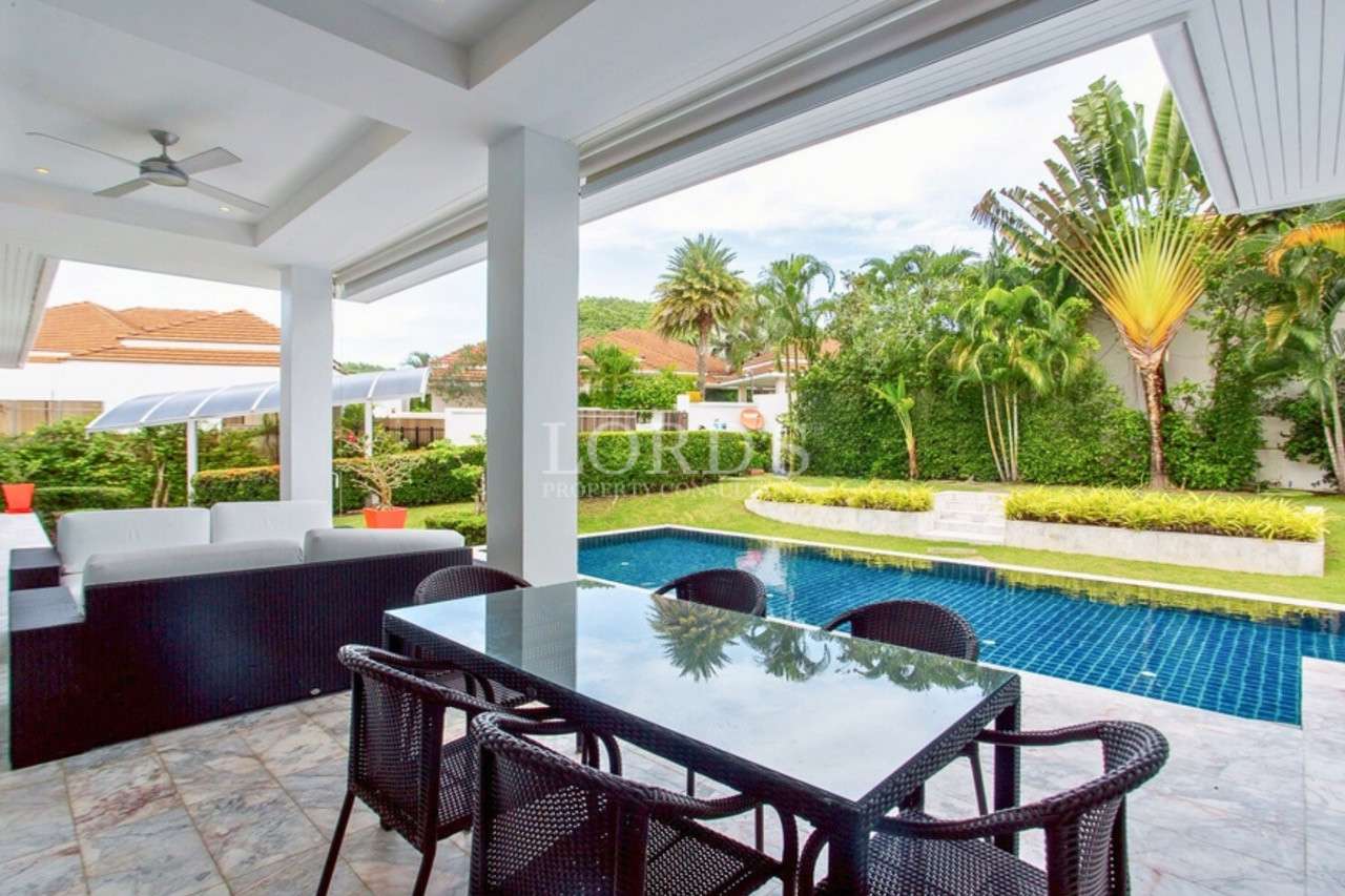 Modern patio with pool view
