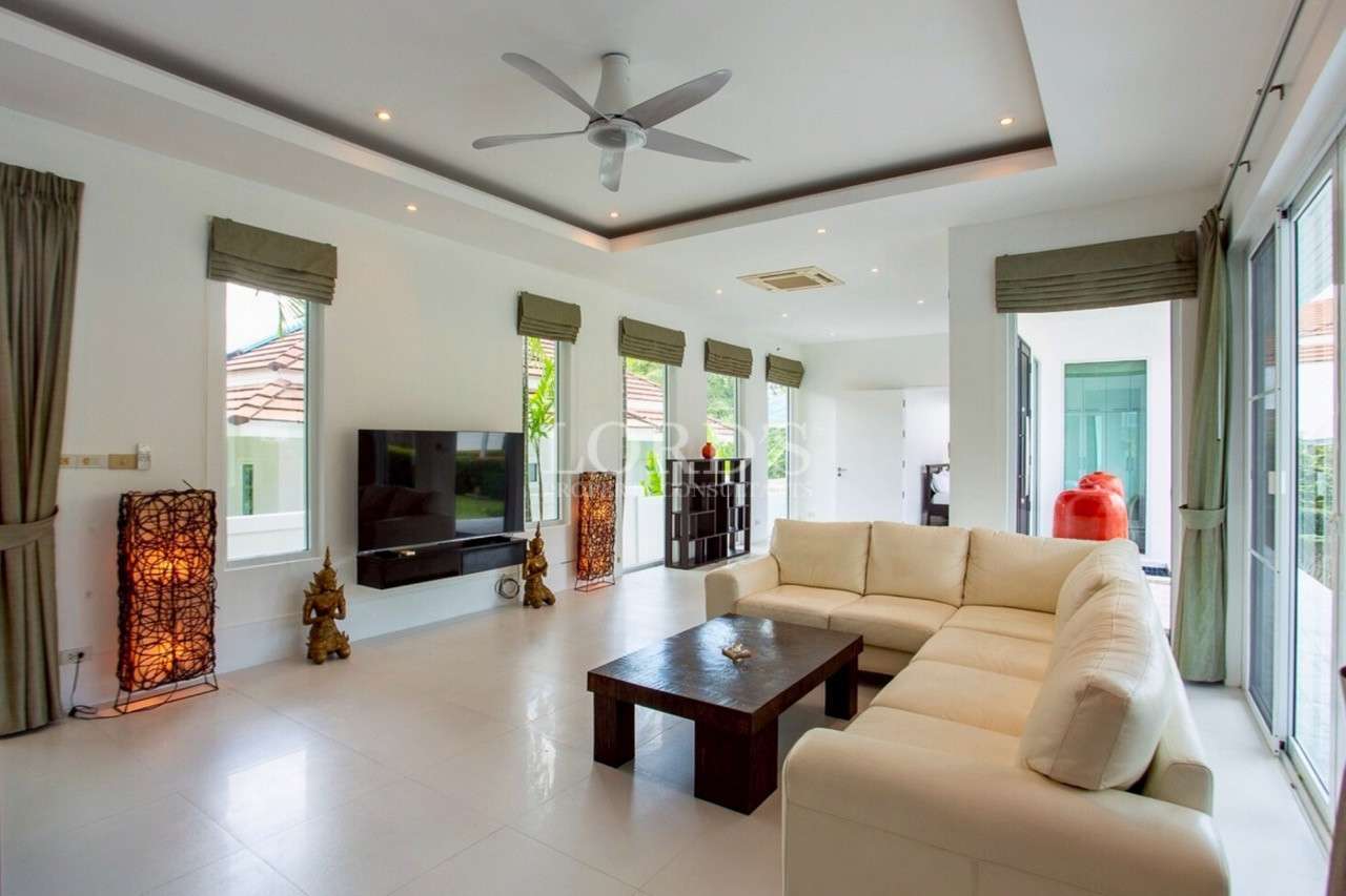 Modern living room with white furniture
