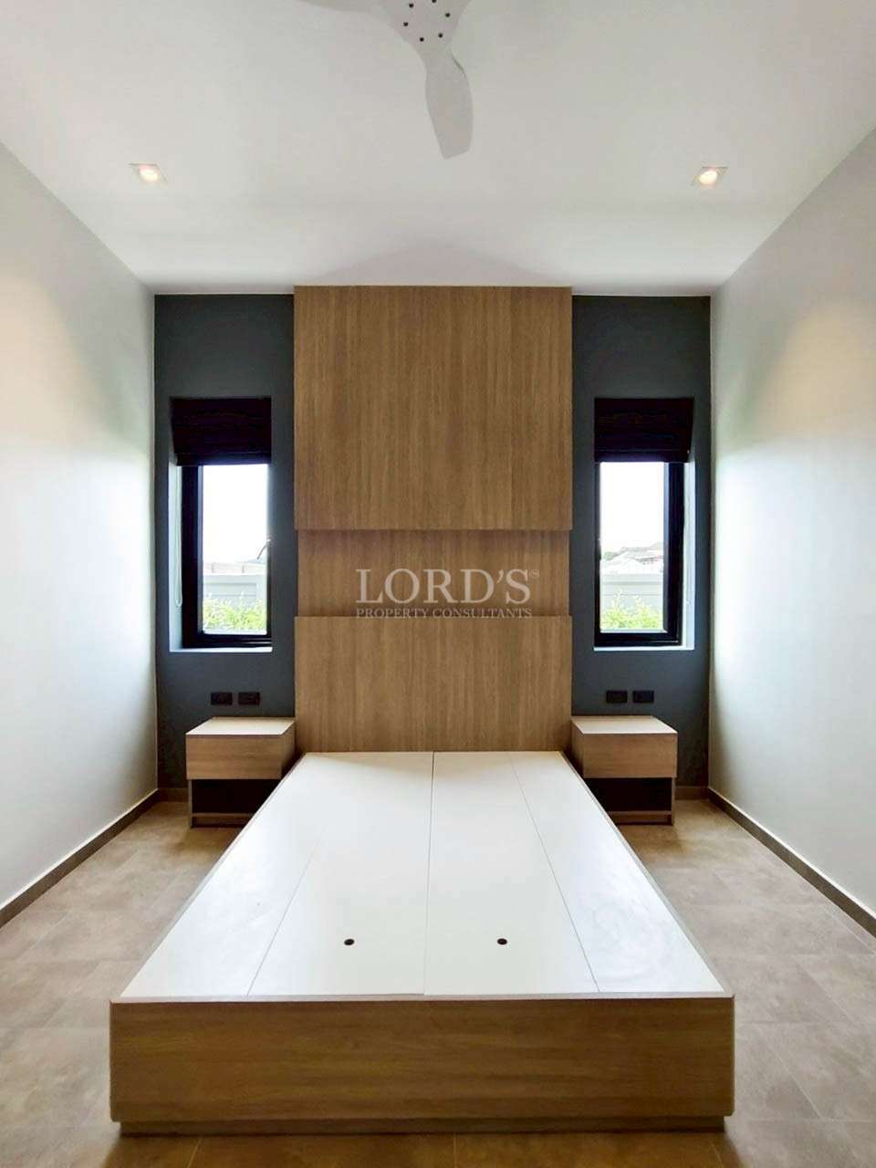 Modern bedroom with built-in wardrobe wall