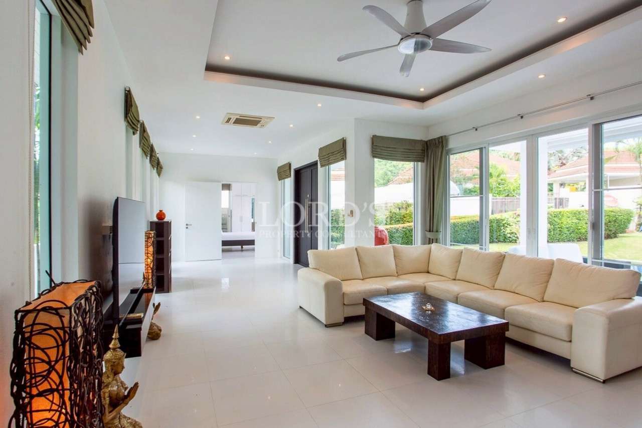 Spacious, modern living room with furniture