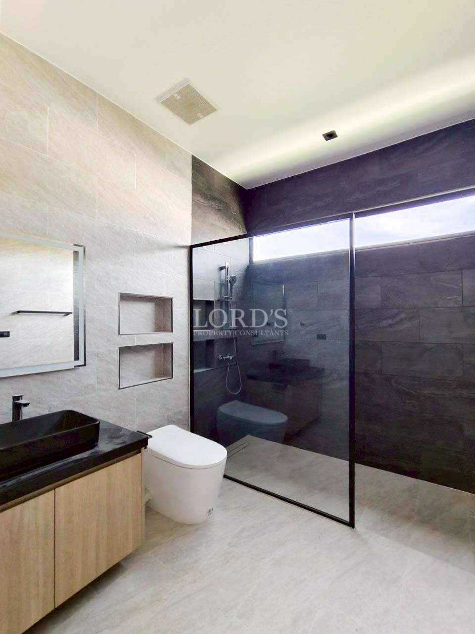 Luxury bathroom with dark accent wall
