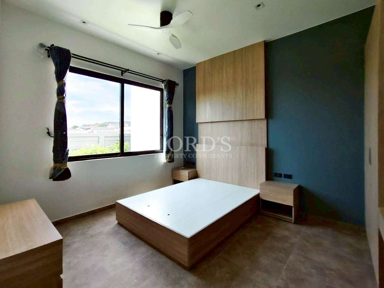 Modern bedroom with large window