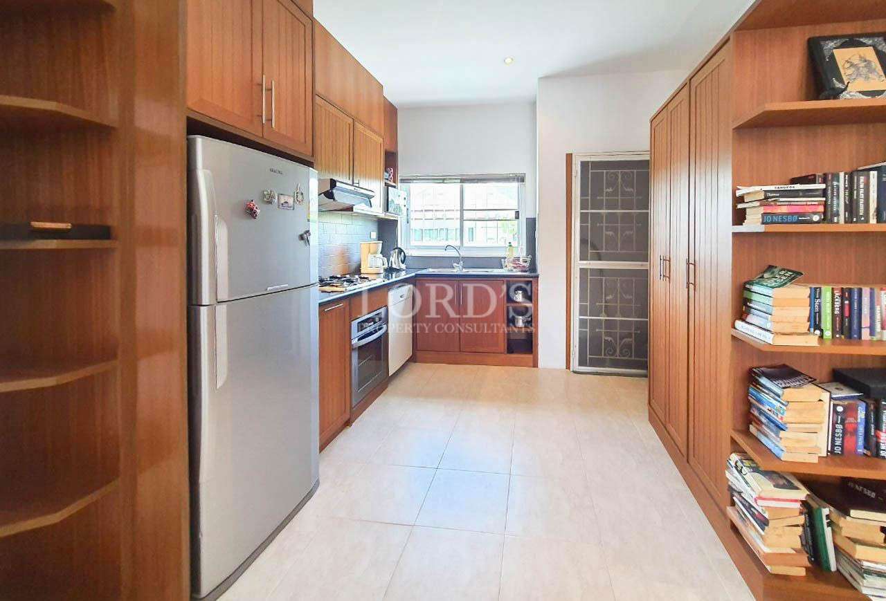Kitchen with open layout and cabinets