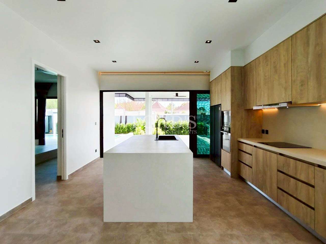 Kitchen with island and sliding doors