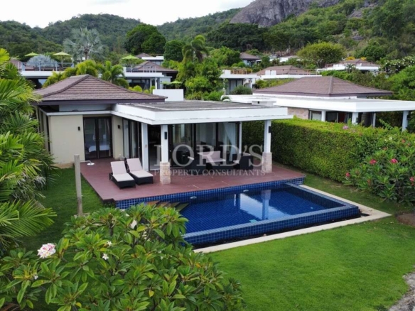 Stylish outdoor seating area with garden view