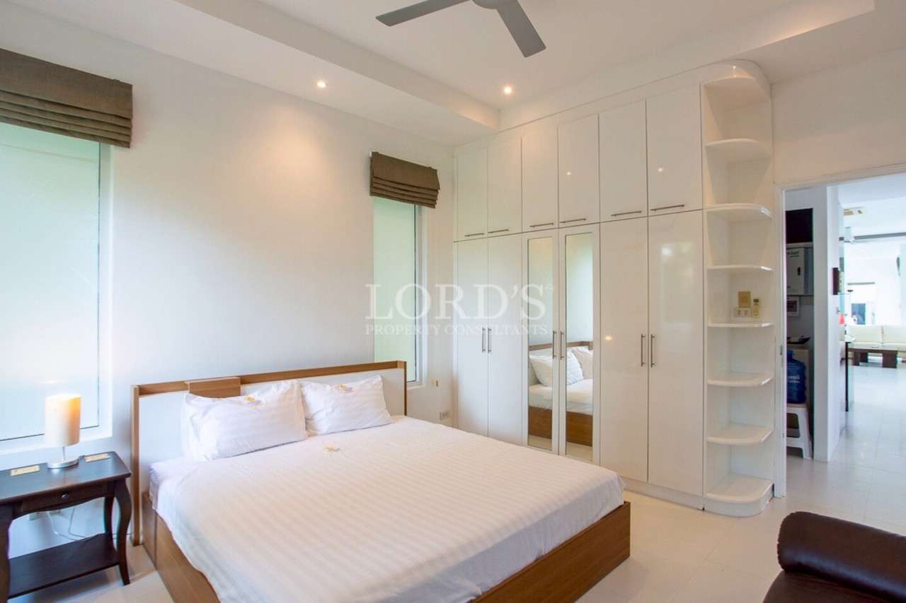 Modern bedroom with large wardrobe