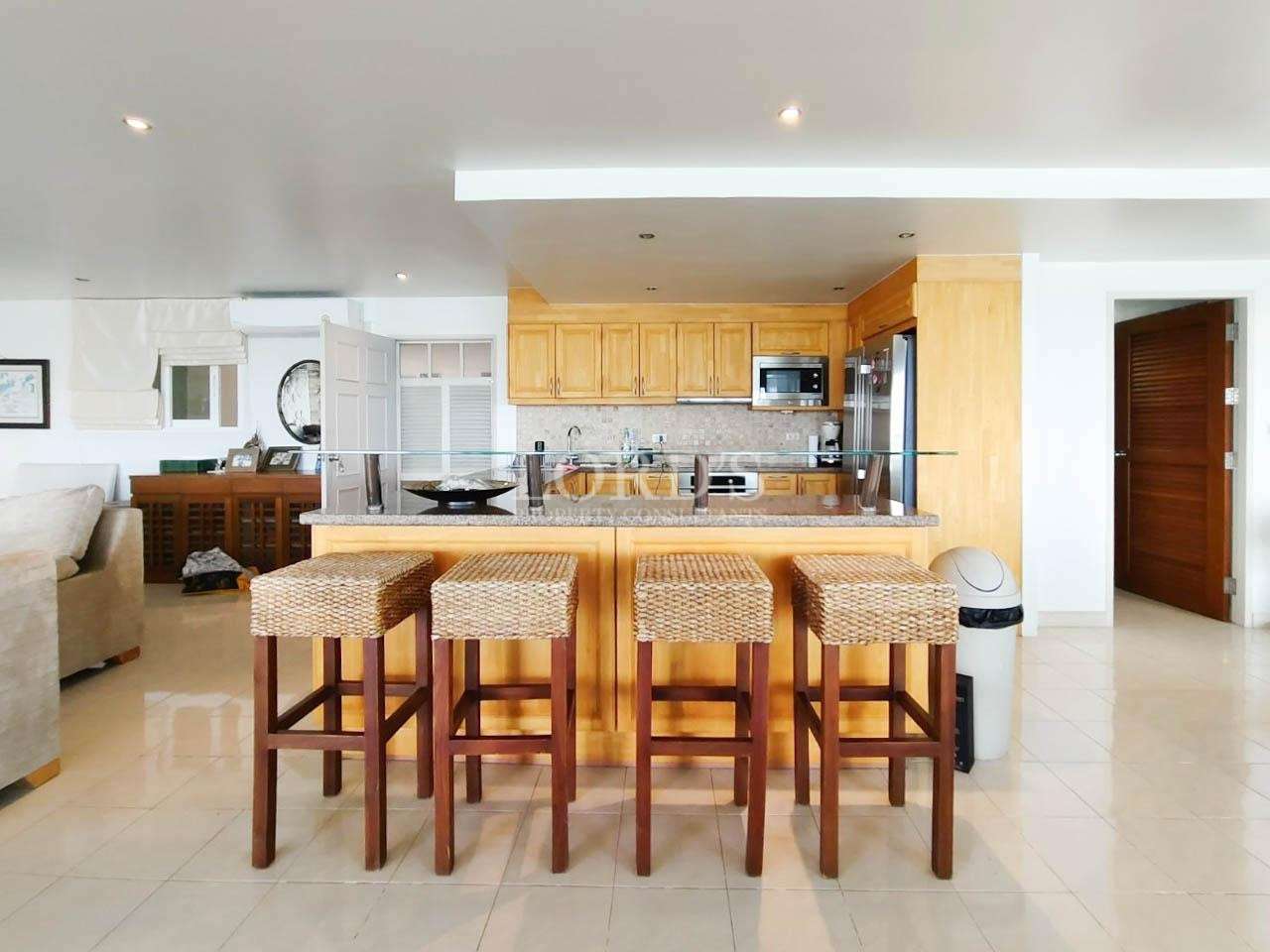 Kitchen island with wooden stools