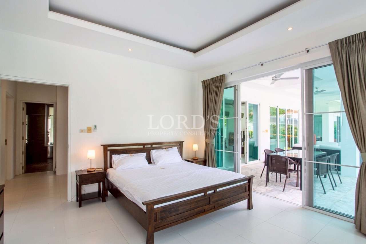 Modern bedroom with patio access