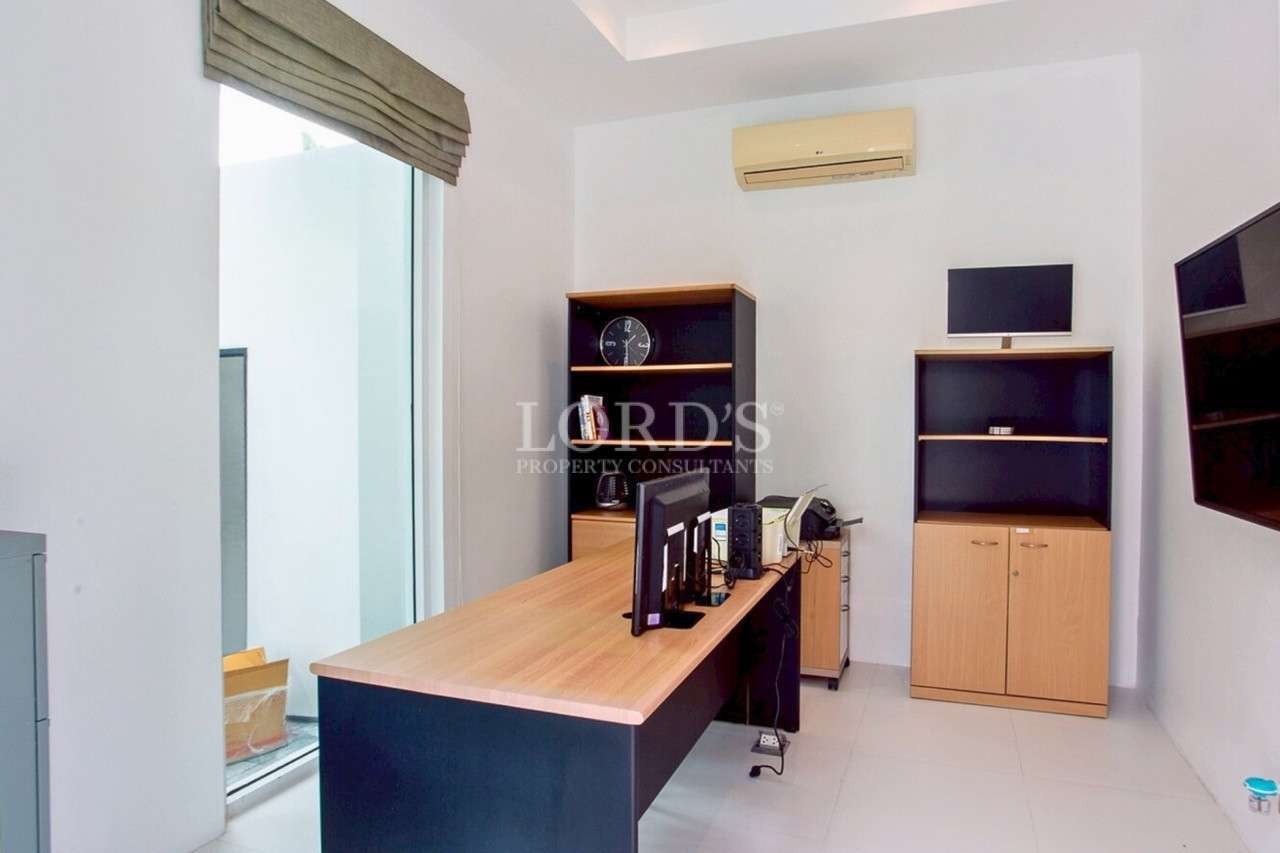 Modern office with wooden desk