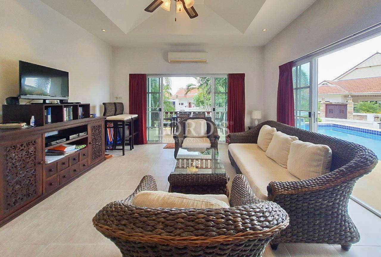 Living room with large sofa and carpet