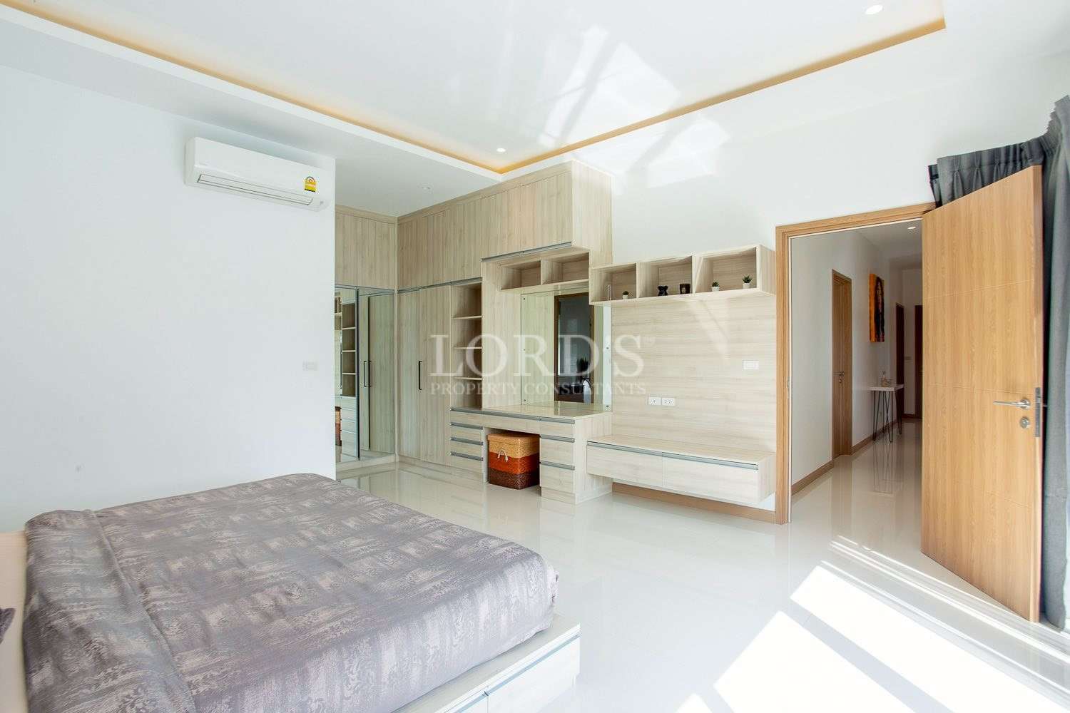 Bedroom with bed and built-in wardrobe