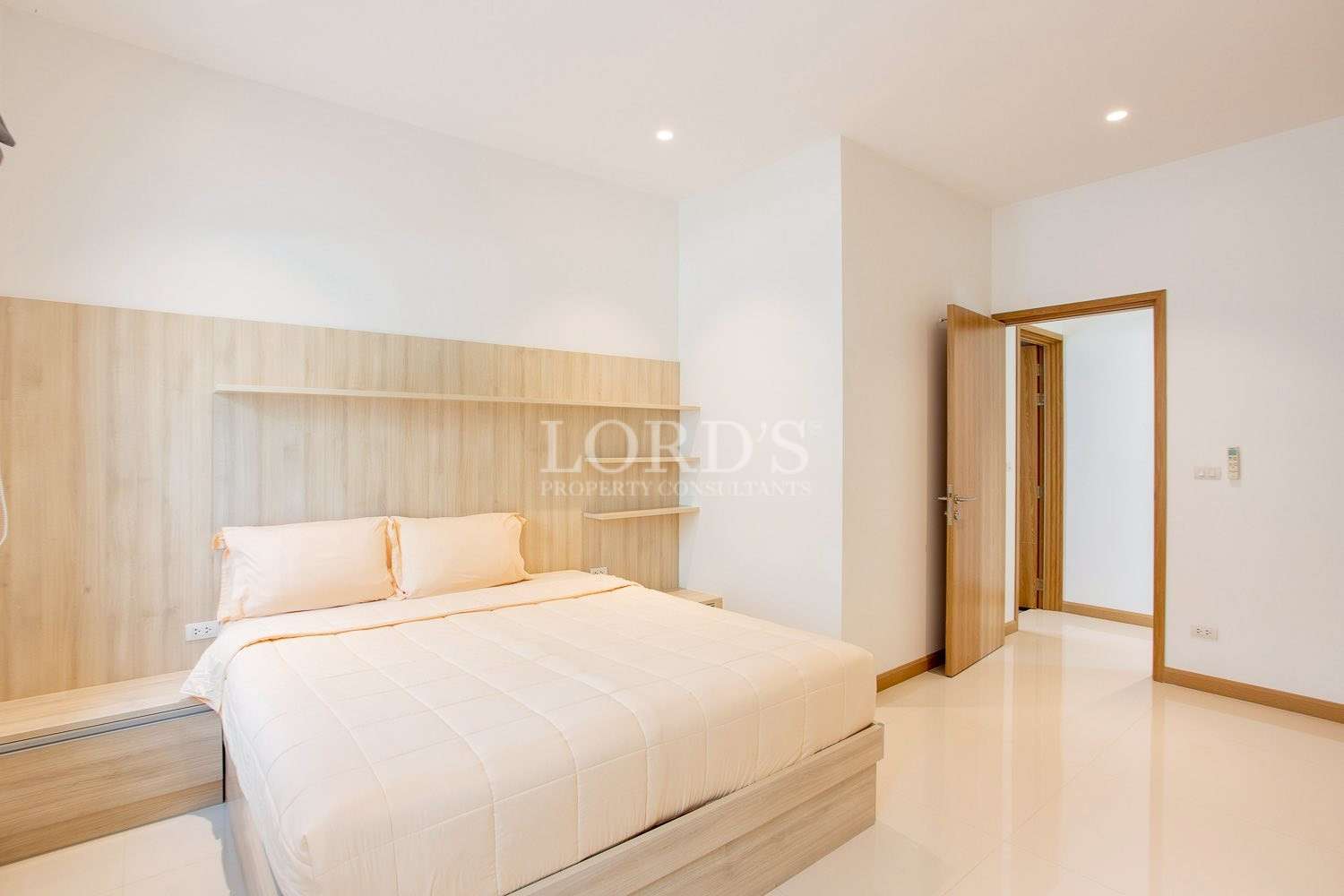 Bedroom with bed and soft lighting