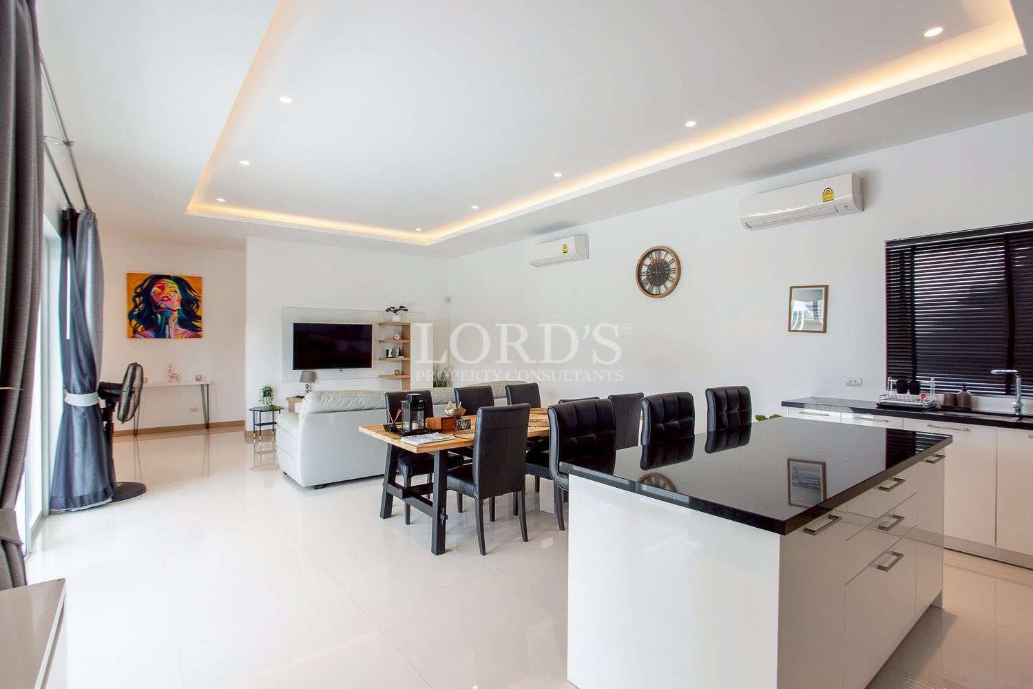 Dining area with long table and chairs
