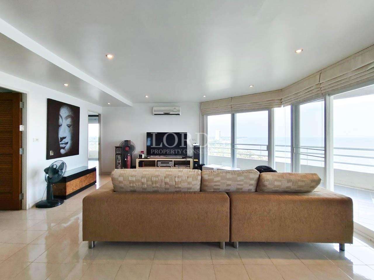 Living room with curved window design