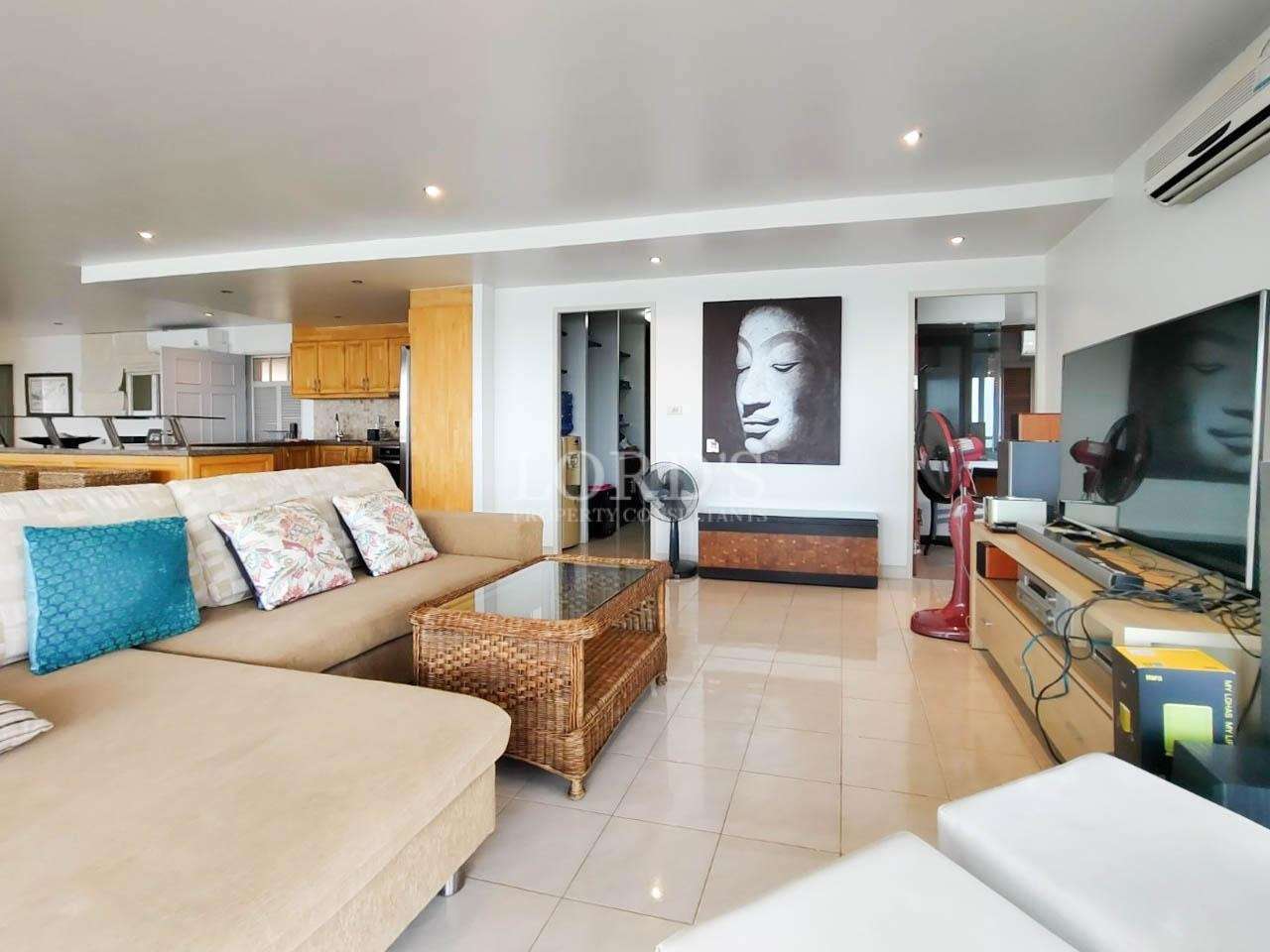 Living room with artwork and sofa