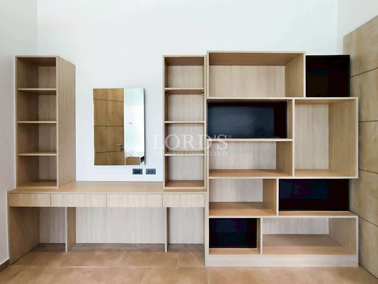 Custom wall shelving unit