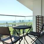 Balcony seating with ocean or landscape view