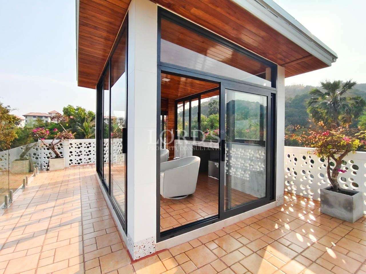 Modern balcony with wooden ceiling