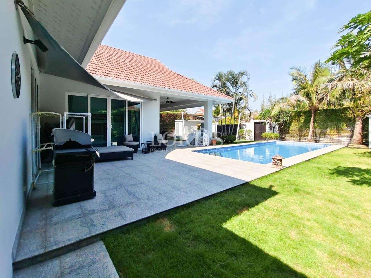 Modern villa terrace with swimming pool view