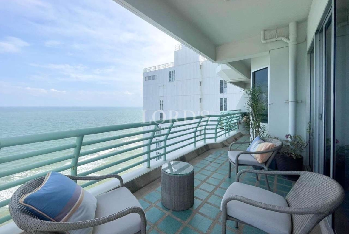 Modern balcony with seating and sea view