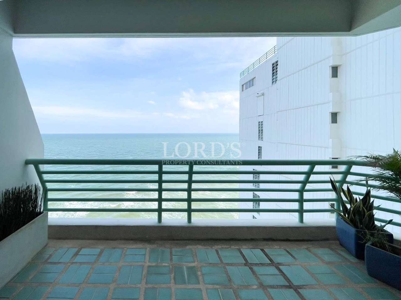 Balcony with tiled floor and ocean view