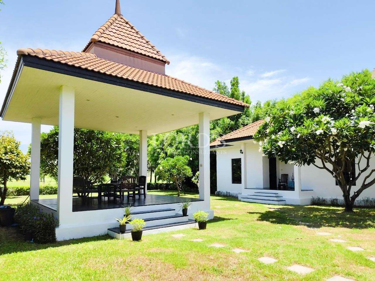 Garden pavilion with pillars and seating