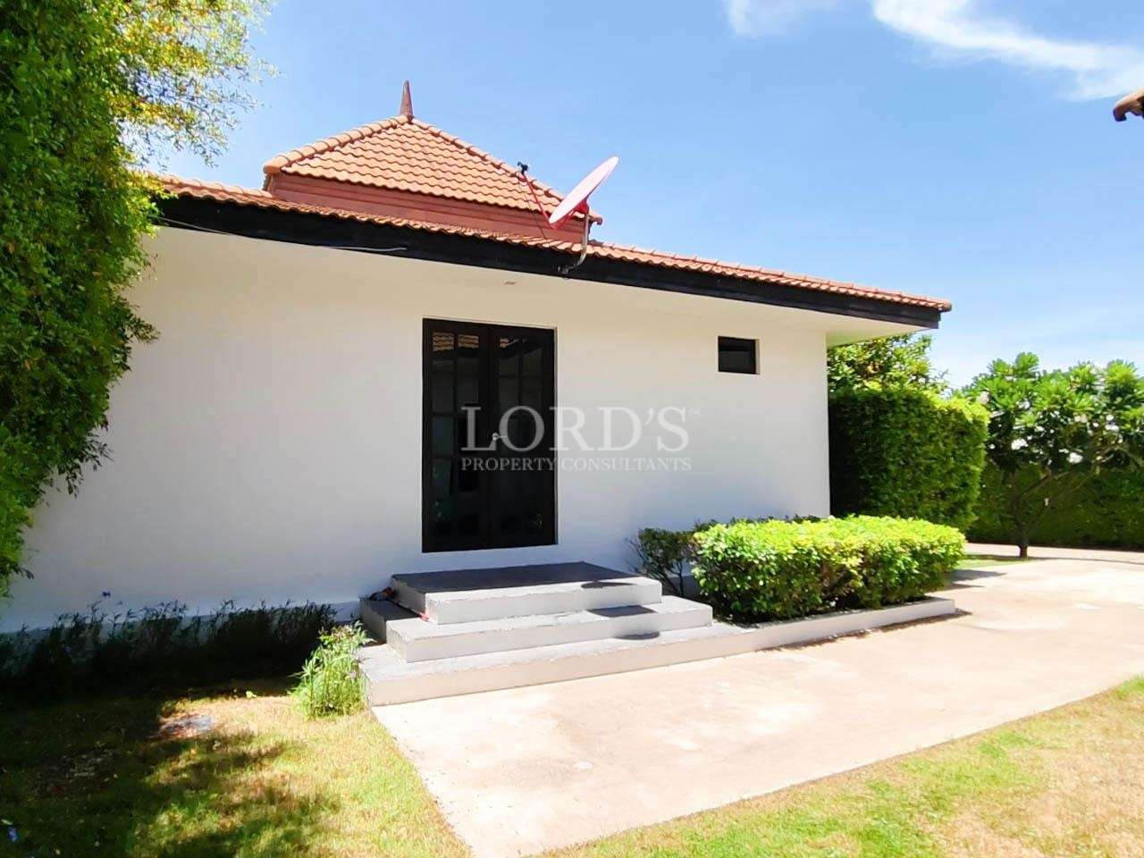 House entrance with garden and pathway