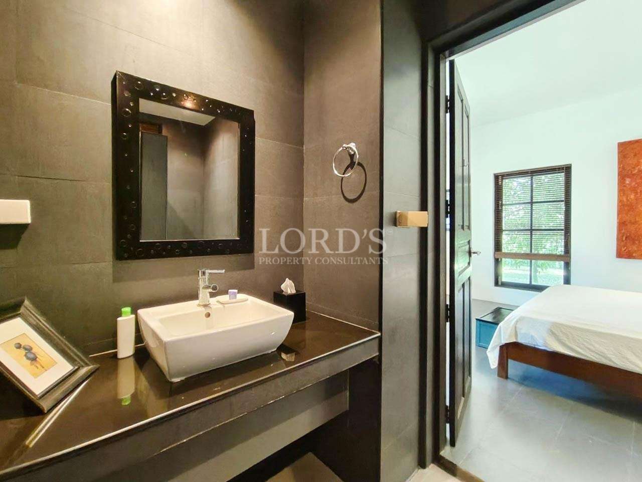 Bathroom with sink and mirror