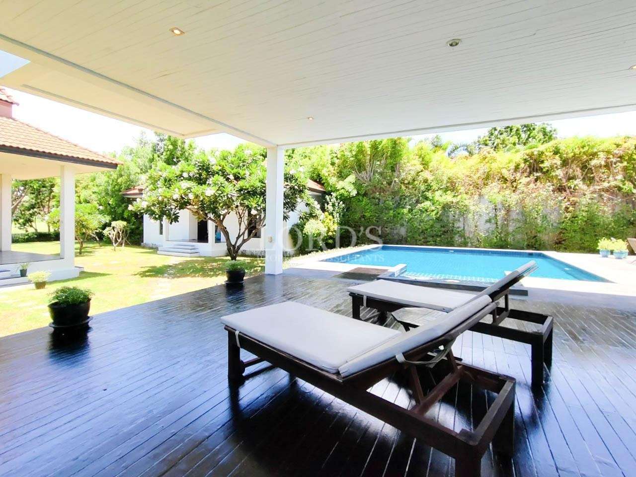Outdoor dining area near pool