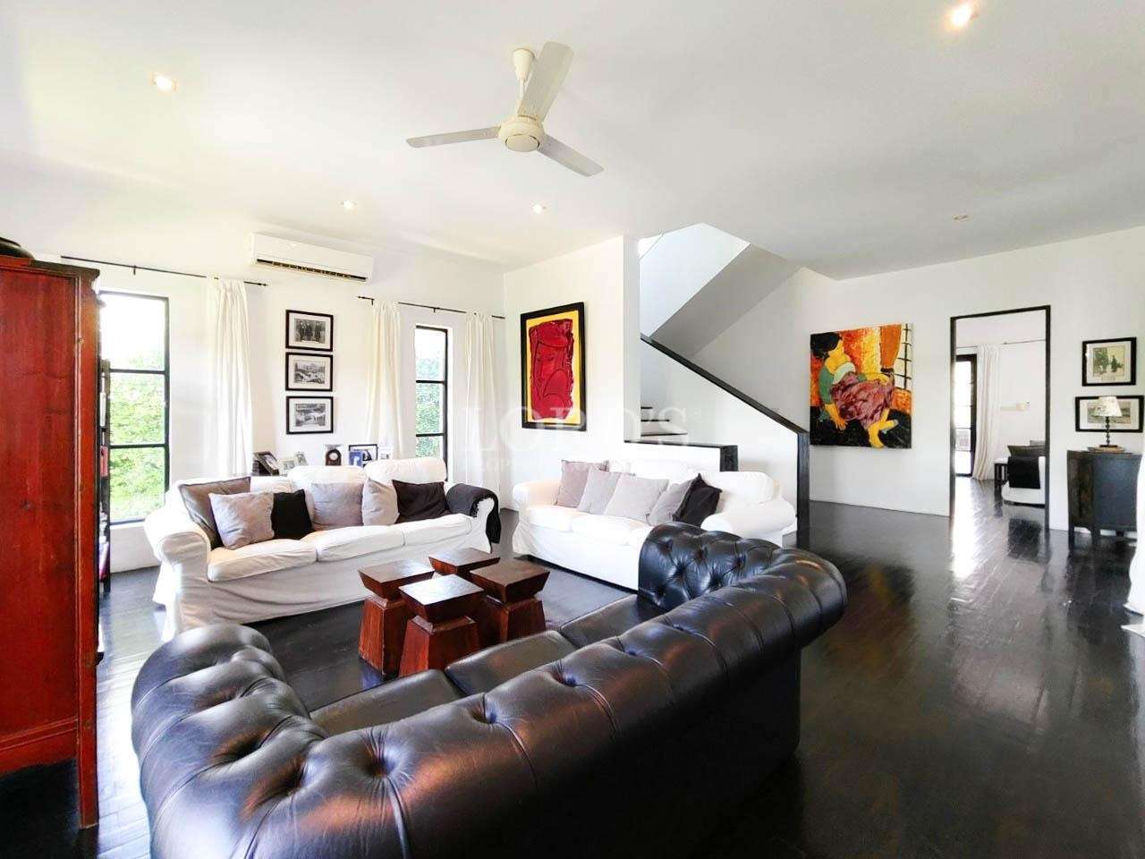 Living space with modern furniture and lighting