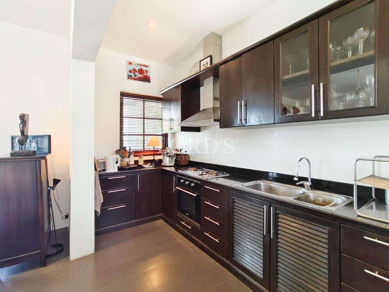 Open kitchen with dining and living area