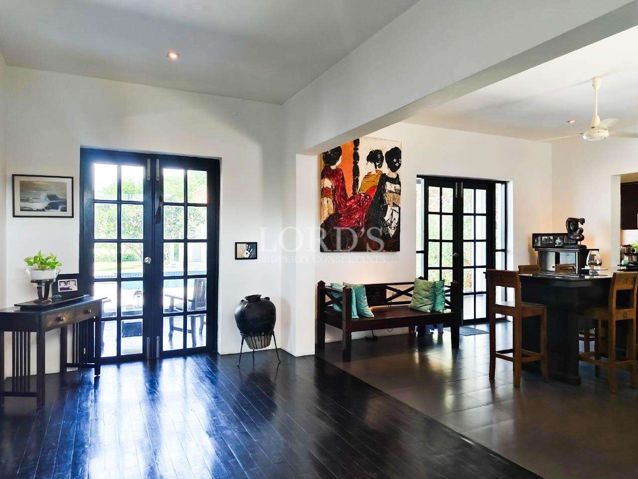 Living area with artwork and seating