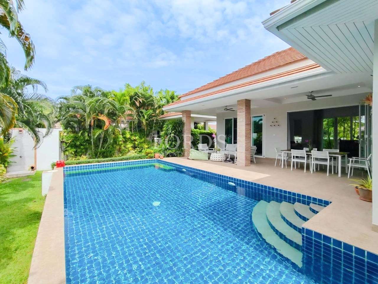 Modern villa with pool and patio