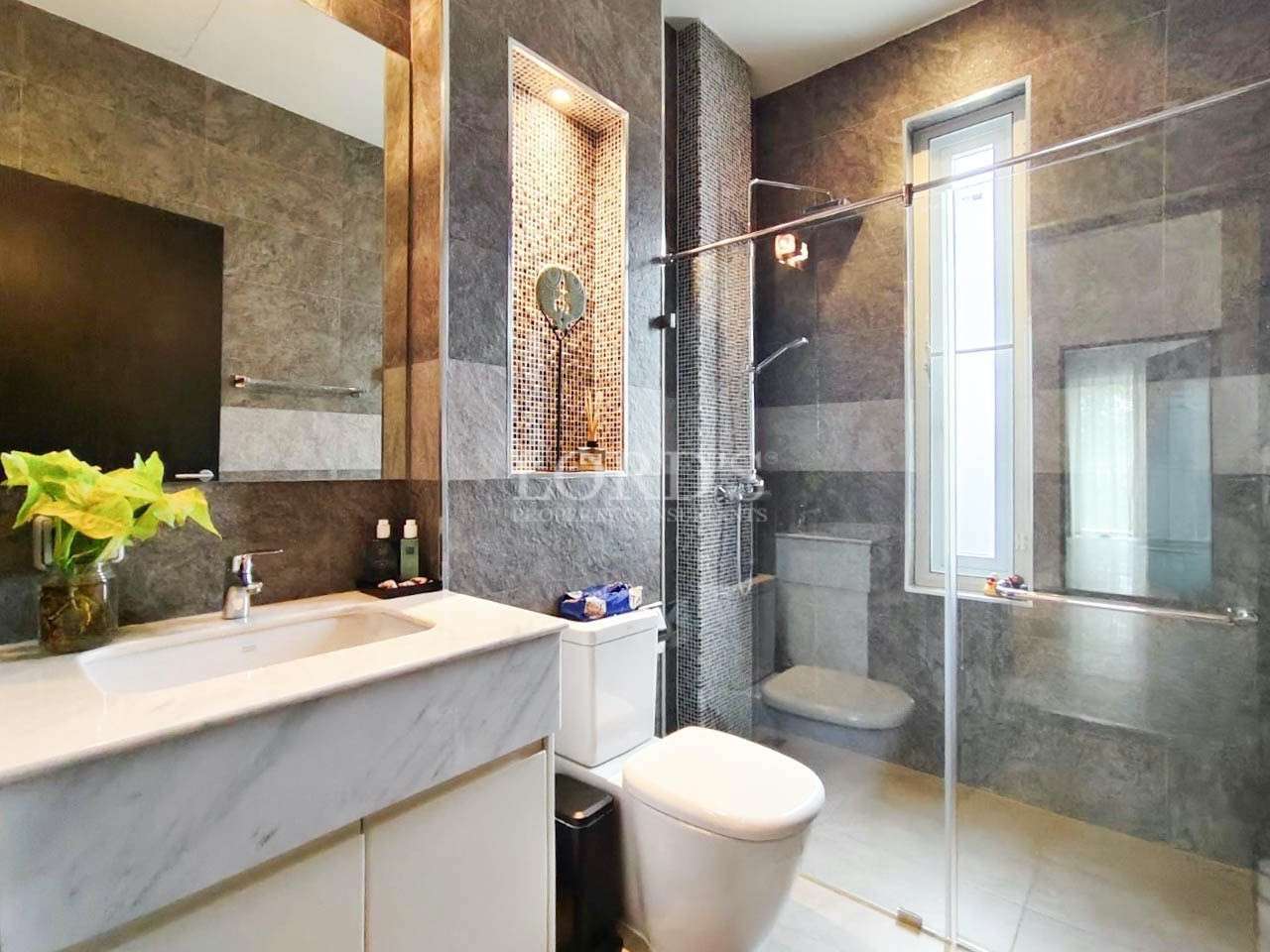 Bathroom with bathtub and shower area