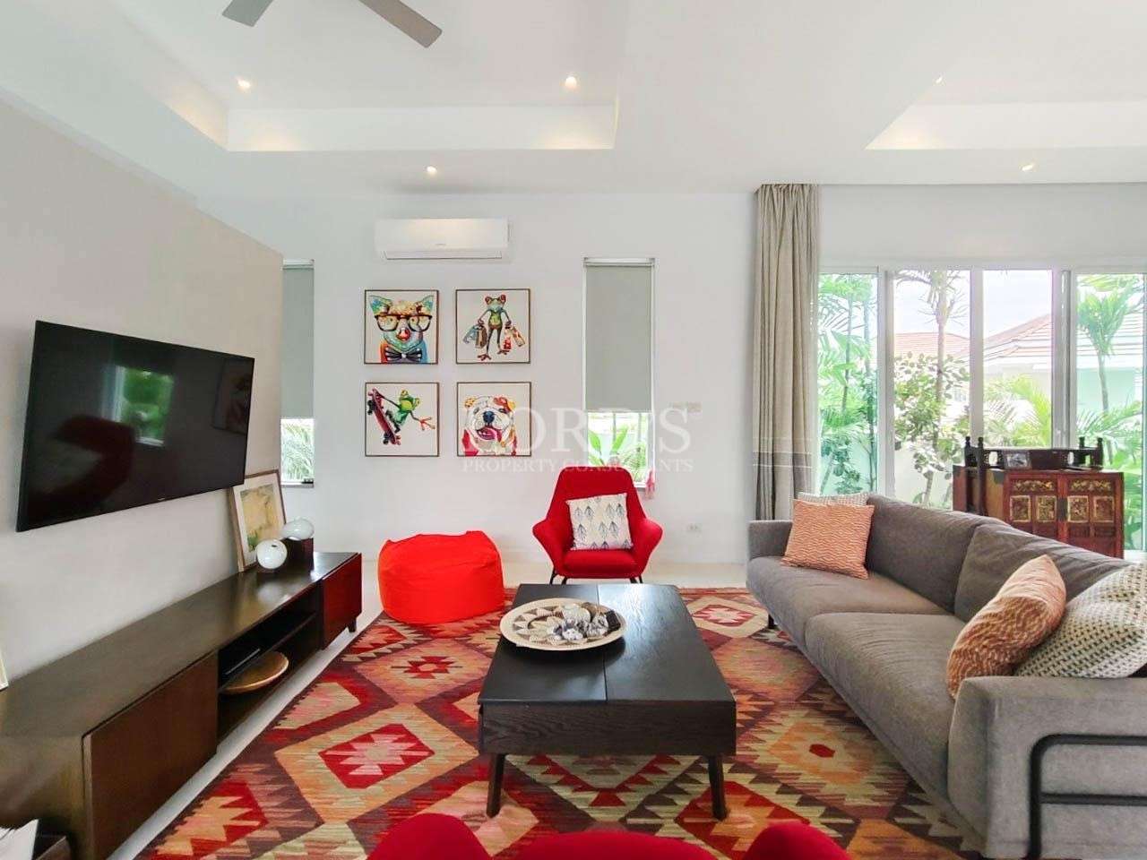 Living room with artwork and sofa