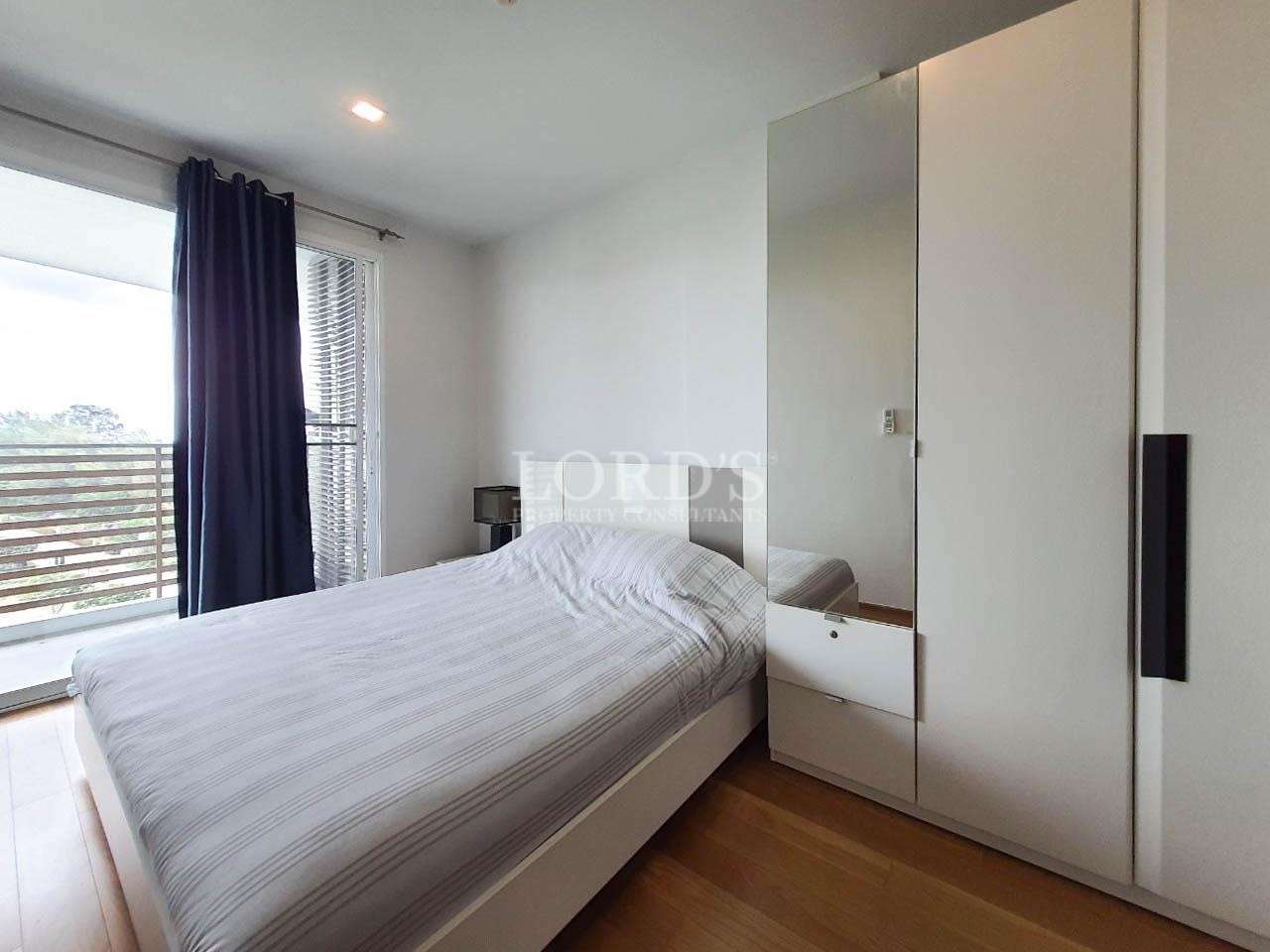 Bedroom with bed and window view