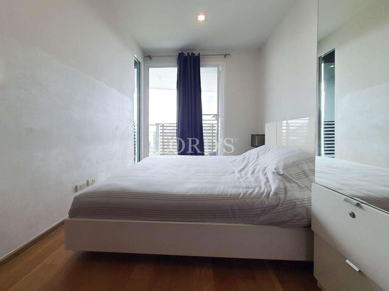 Bedroom with bed and window light