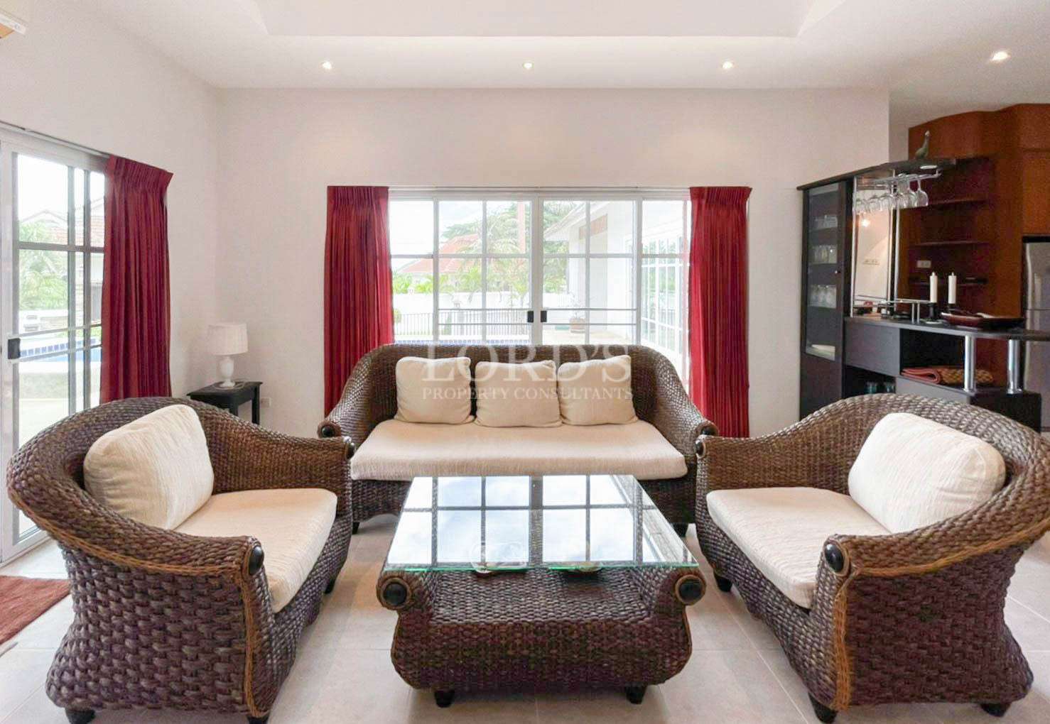 Living room with sofa and large window